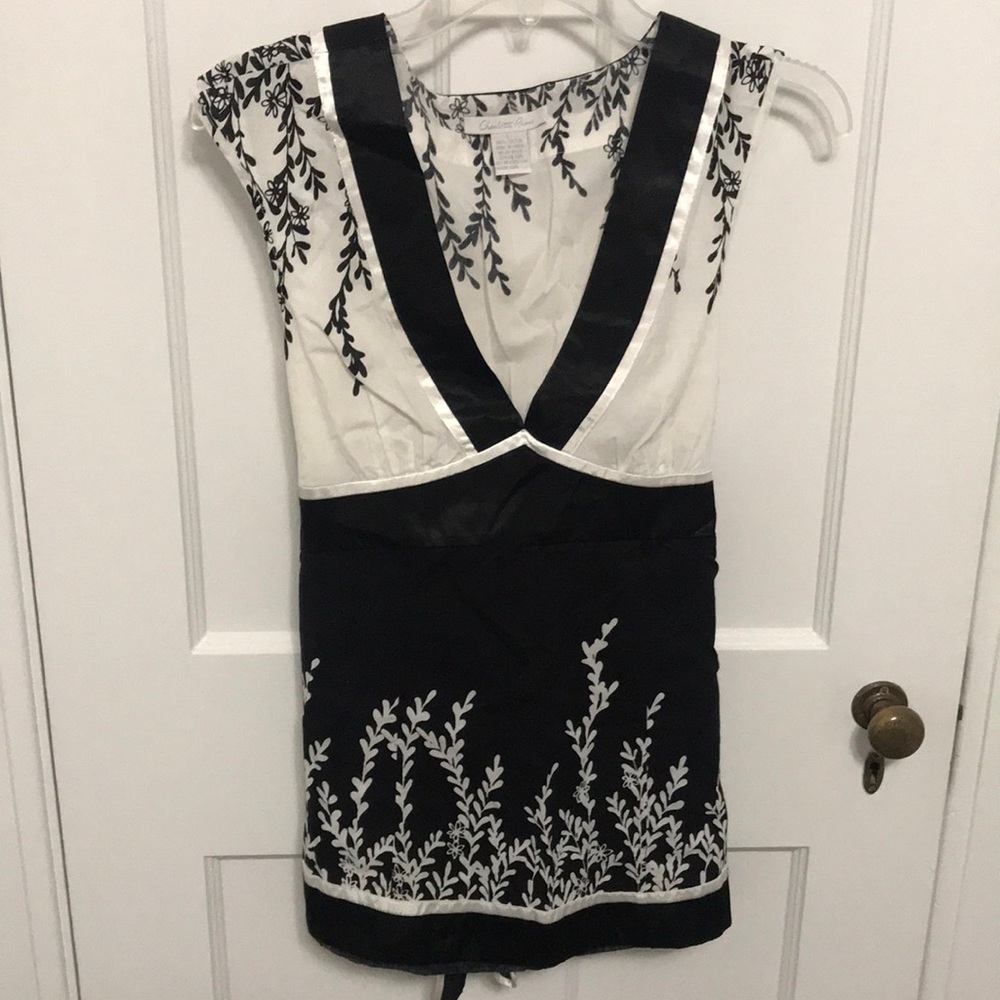 Black and white floral sleeveless blouse